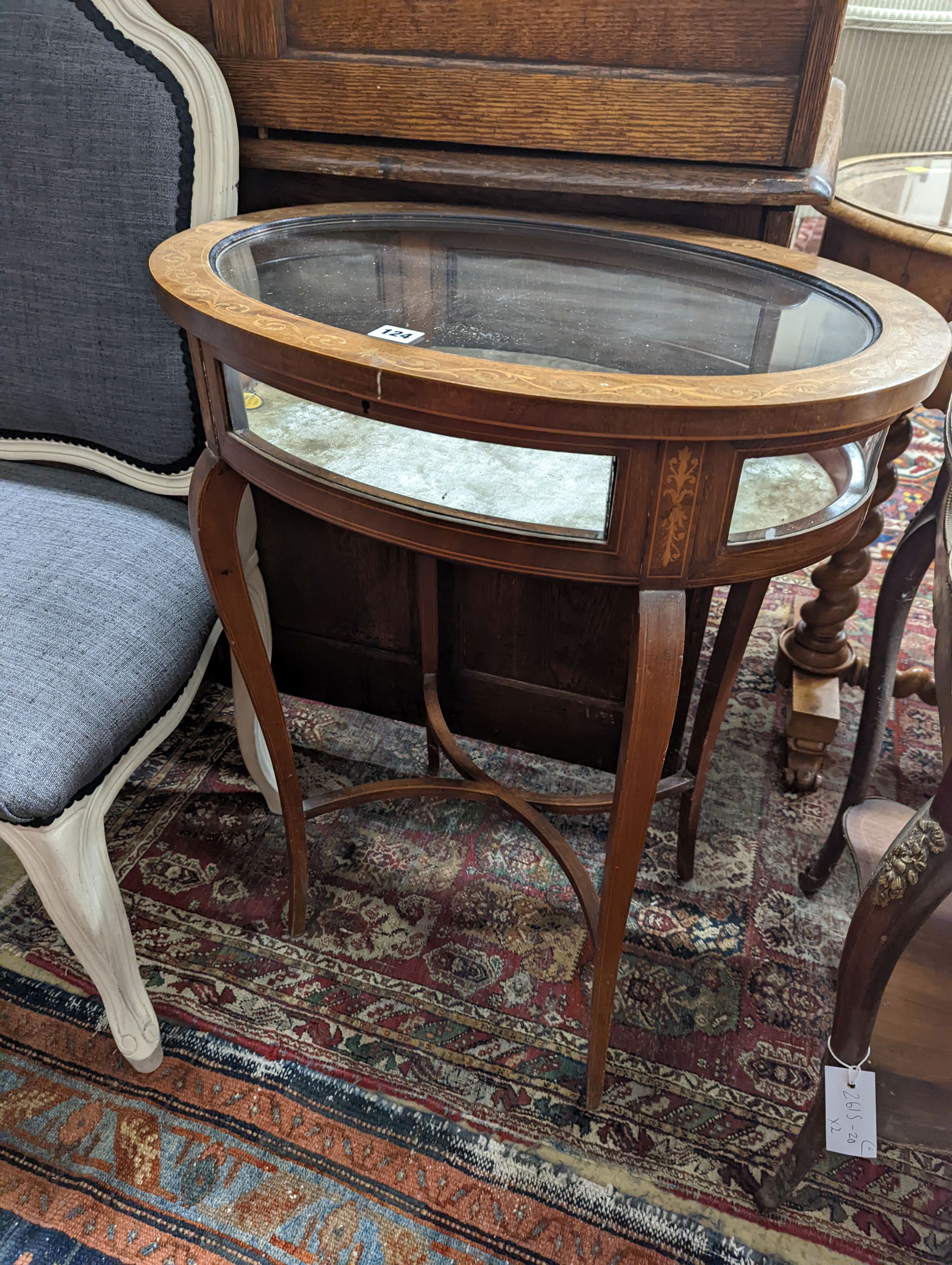 An oval marquetry inlaid mahogany bijouterie table, together with a larger rectangular bijouterie table, larger width 64cm, depth 46cm, height 72cm